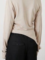 ASYMMETRY FRILL TOPS / BEIGE