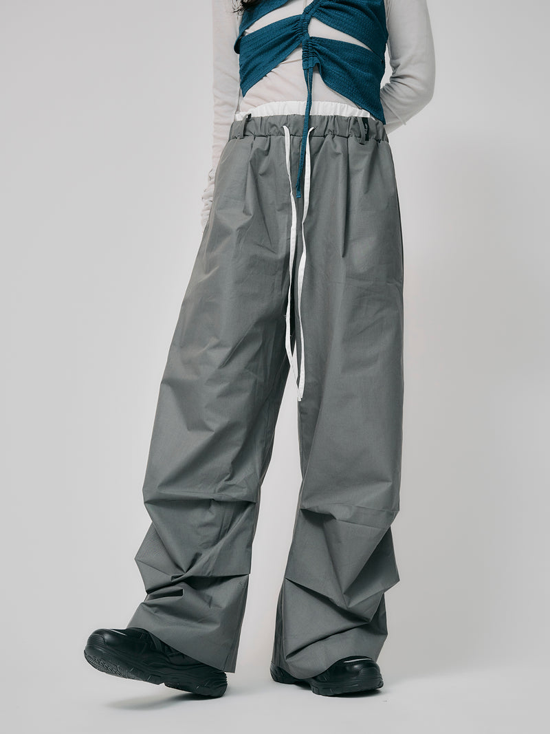 LAYERED TUCK PANTS / GRAY